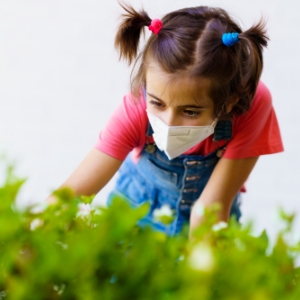 child-girl-wearing-a-protection-mask-against-coron-UKDXJHU.jpg